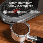 51mm aluminium alloy portafilter with coffee grounds on a wooden surface