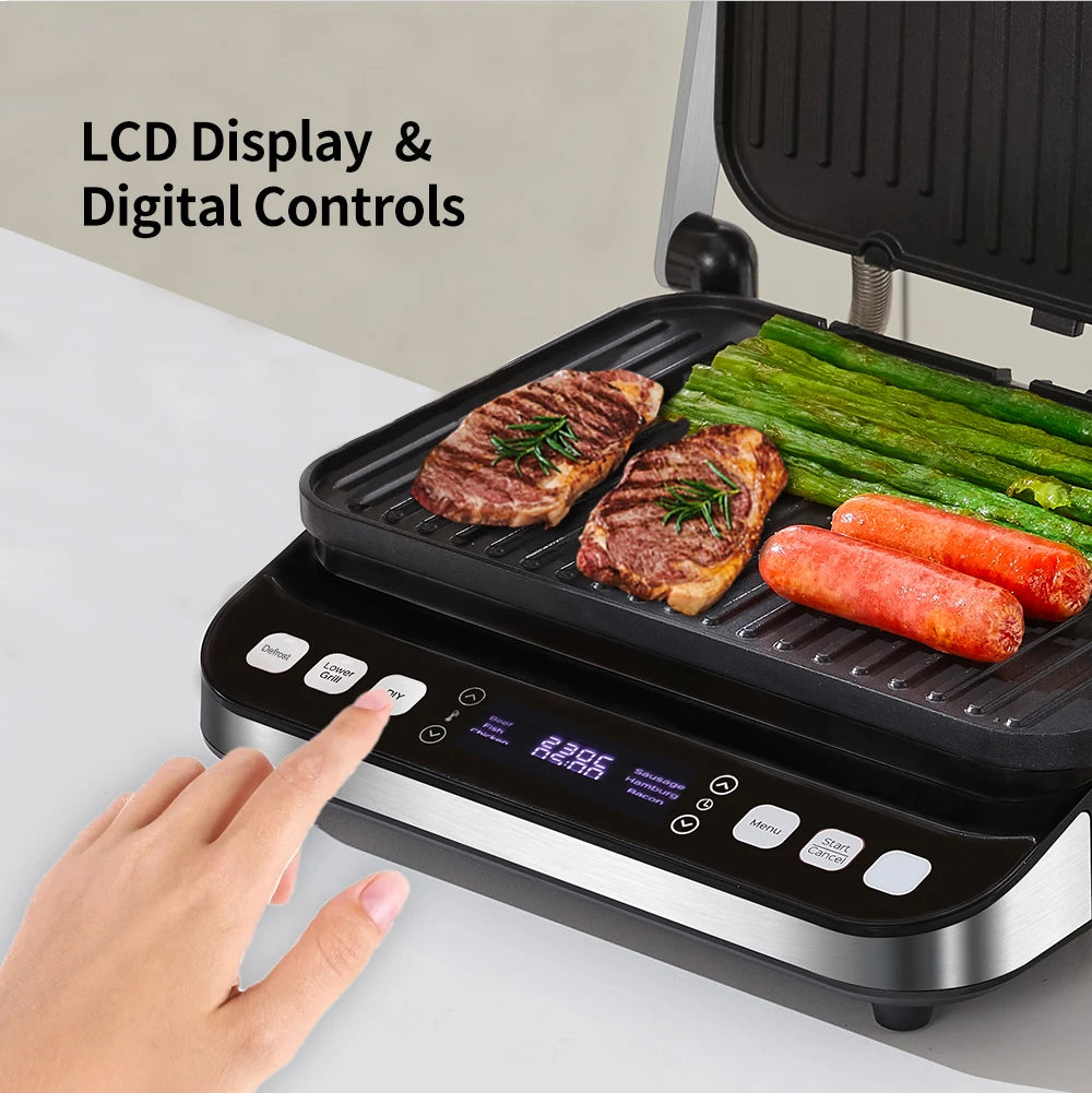 BCG02D Multifunctional grill with digital controls and food being cooked on a light background