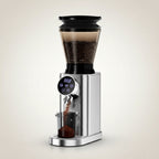 Front view of BioloMix Coffee Grinder with a soft beige background
