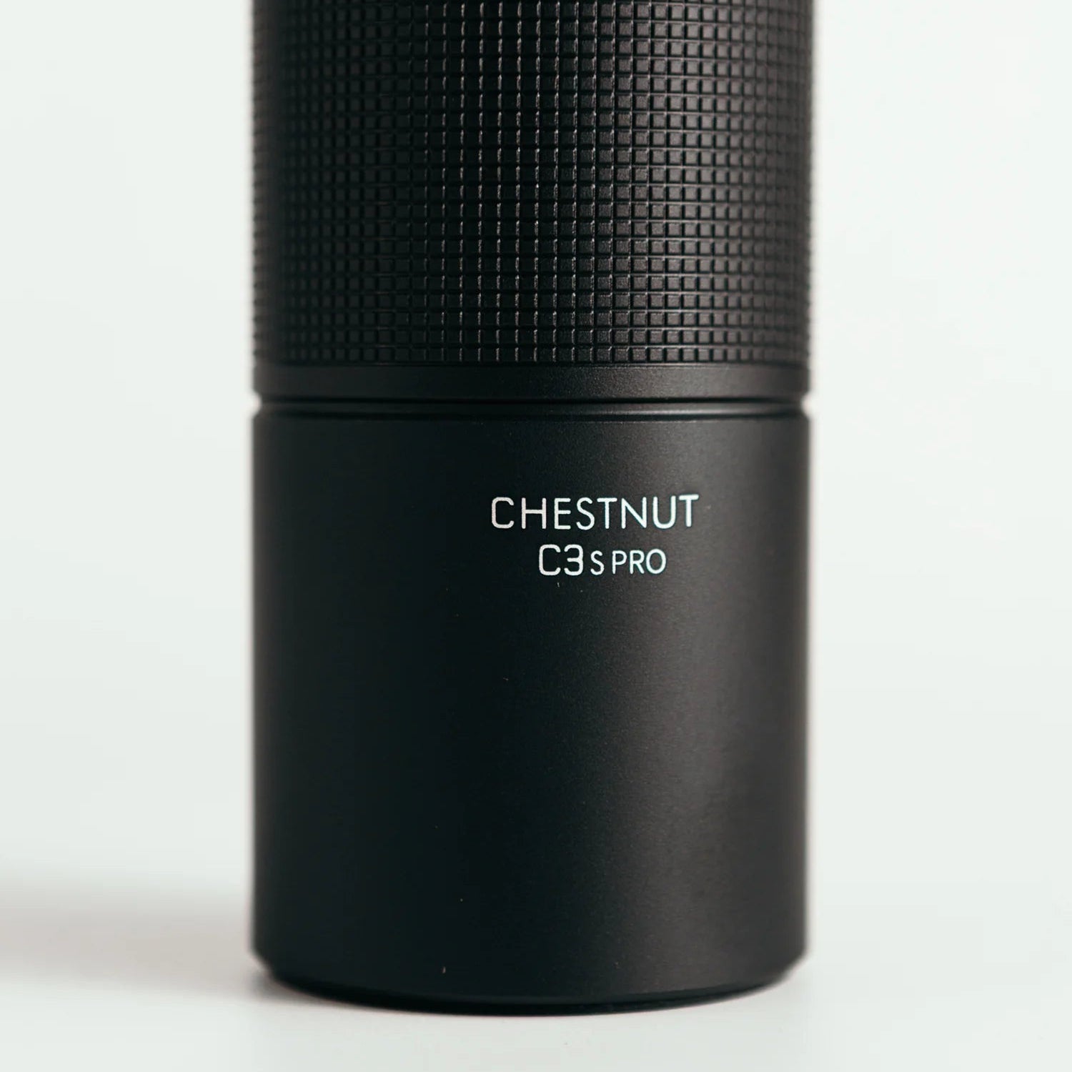 Close up focus shot on a TIMEMORE C3S Pro Coffee Grinder