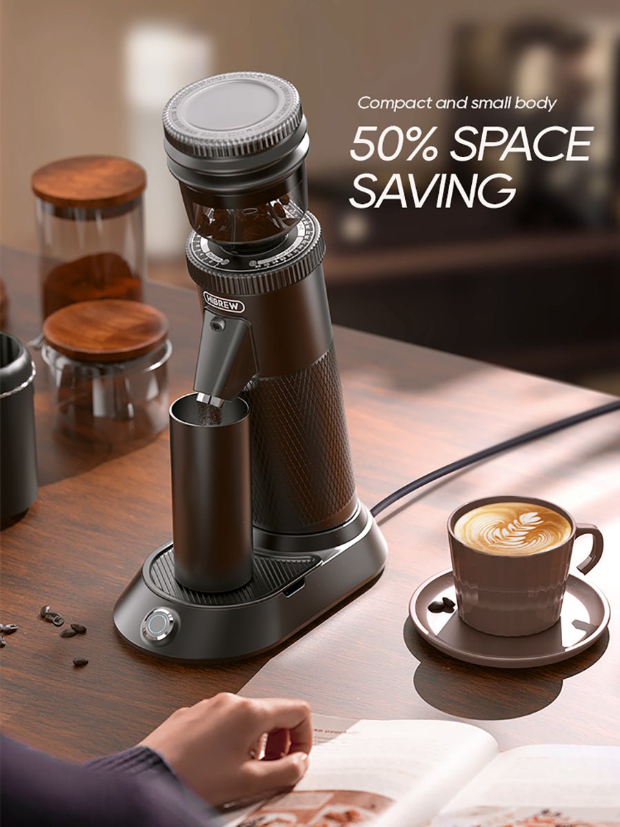 Compact coffee maker on a table with a cup of coffee and text highlighting space-saving feature.