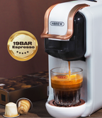 Hibrew H2B espresso machine dispensing coffee into a glass with a 19 bar espresso badge on a brown background.