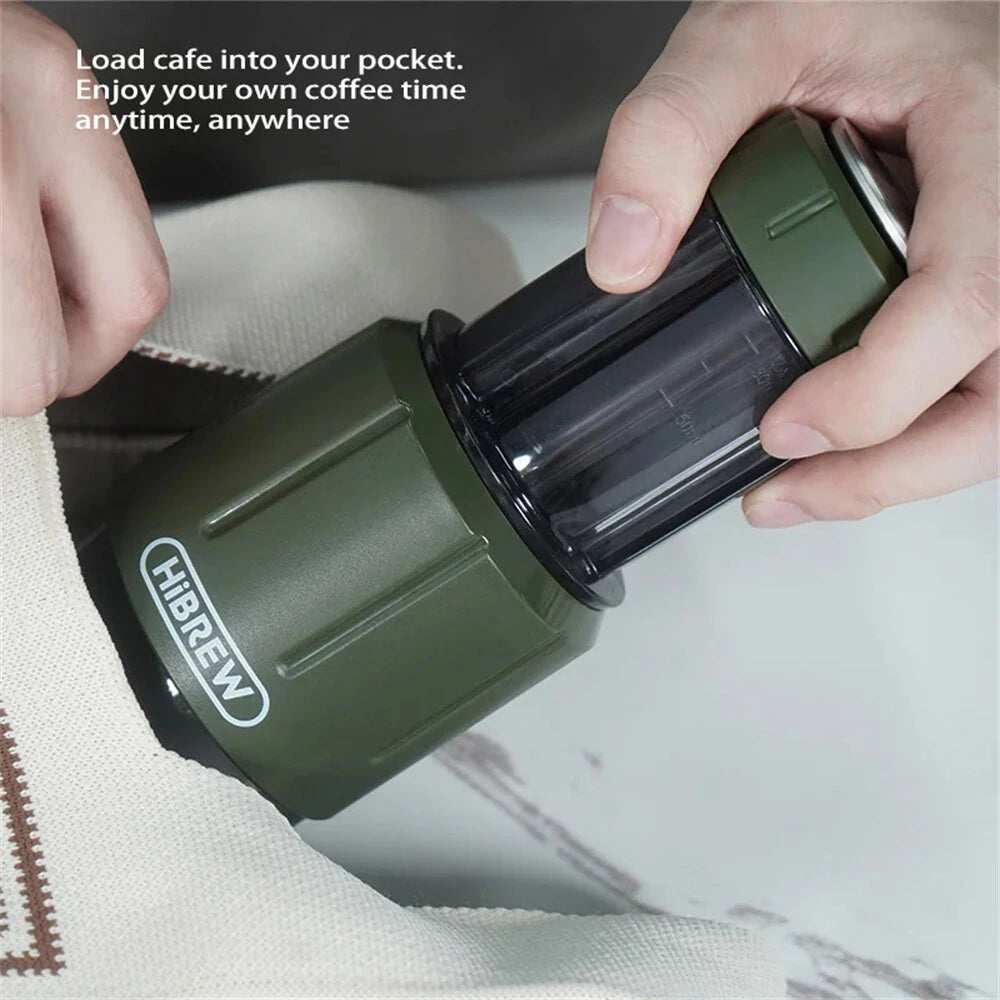 Green portable H4D coffee maker being held by a person with text about enjoying coffee anytime, anywhere.