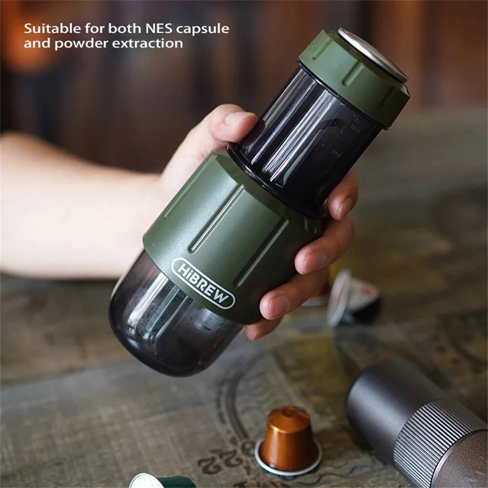 Hand holding a green HiBREW H4D with text 'Suitable for both NES capsule and powder extraction'.