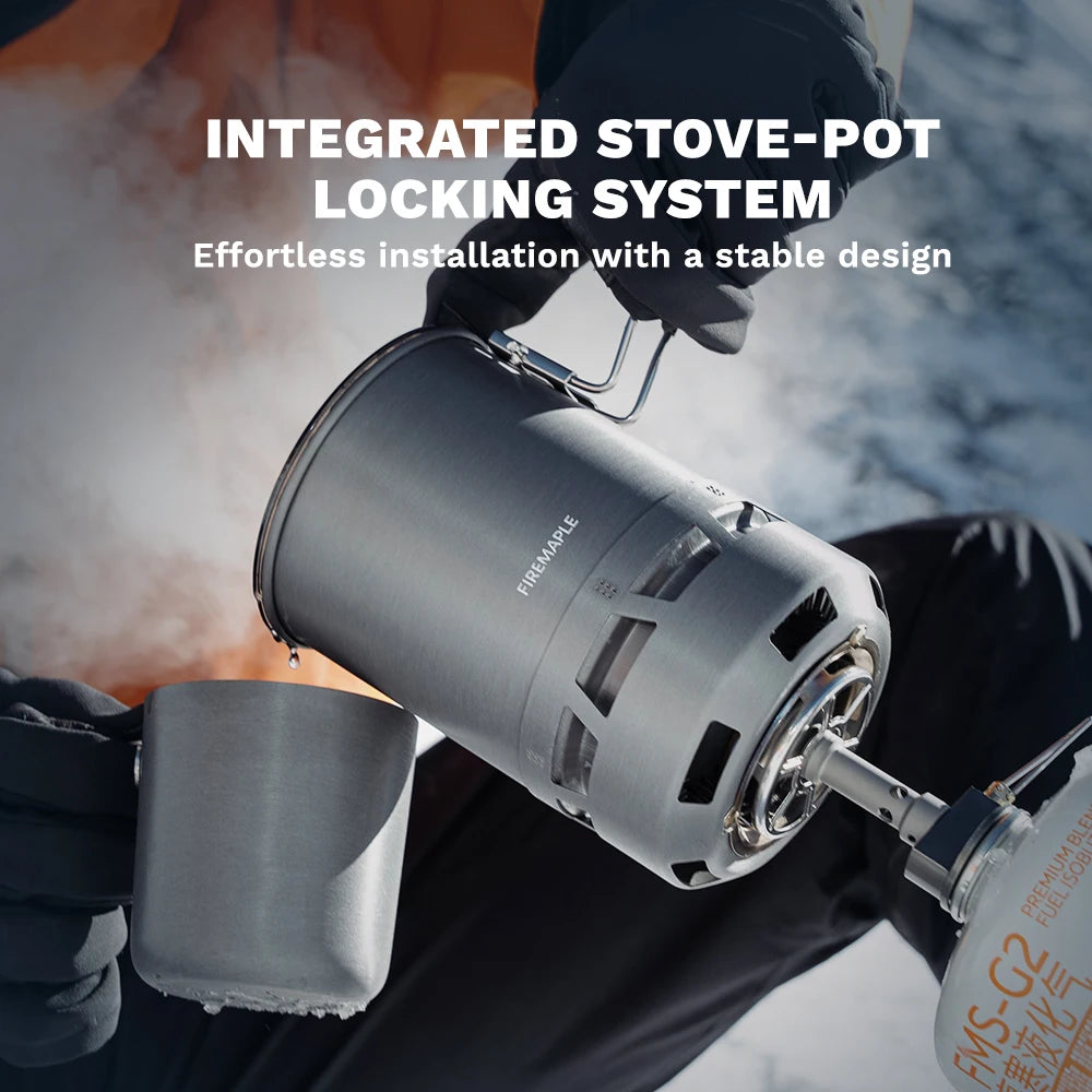 Person using a Fire Maple camping stove with integrated pot, showing the locking system.