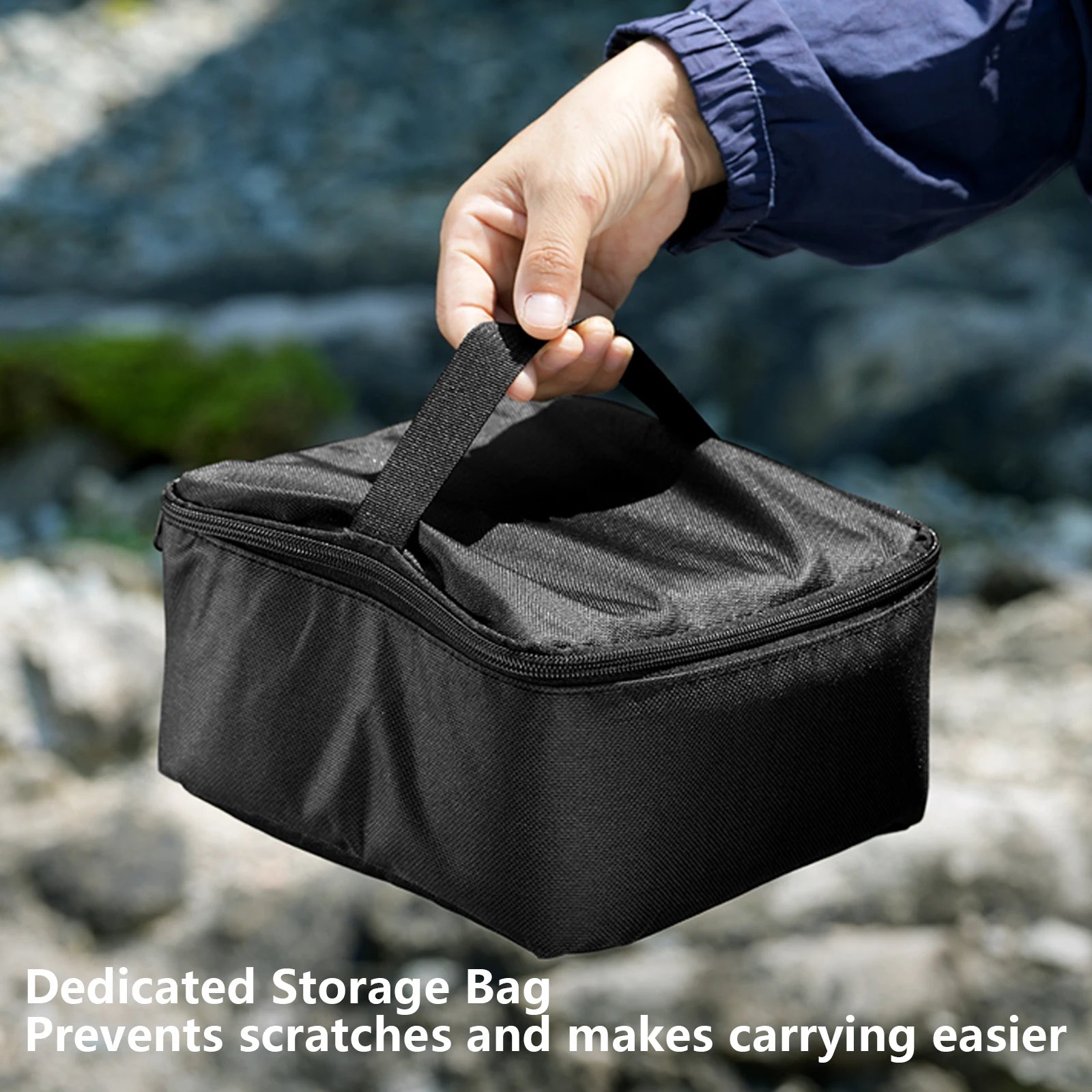 SK275 Black storage bag held by a hand with a natural background