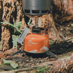 Fire-Maple camping stove with fuel canister on a natural background