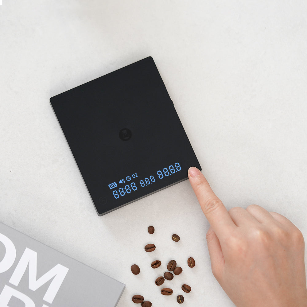 An upshot image of a TIMEMORE Black Mirror Mini coffee scale. 