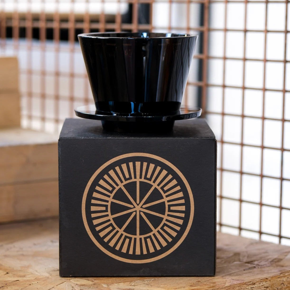 Black B75 Dripper on top of original packaging 